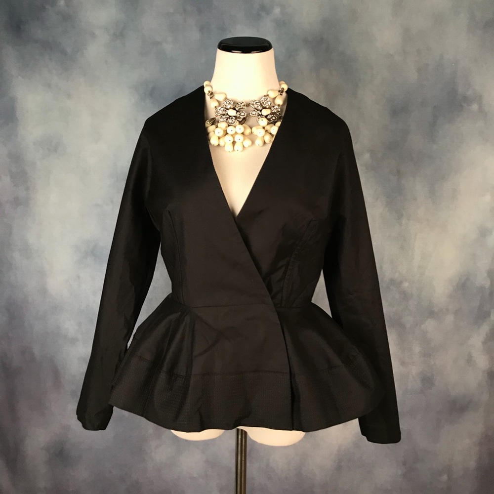 Black peplum jacket size S.
